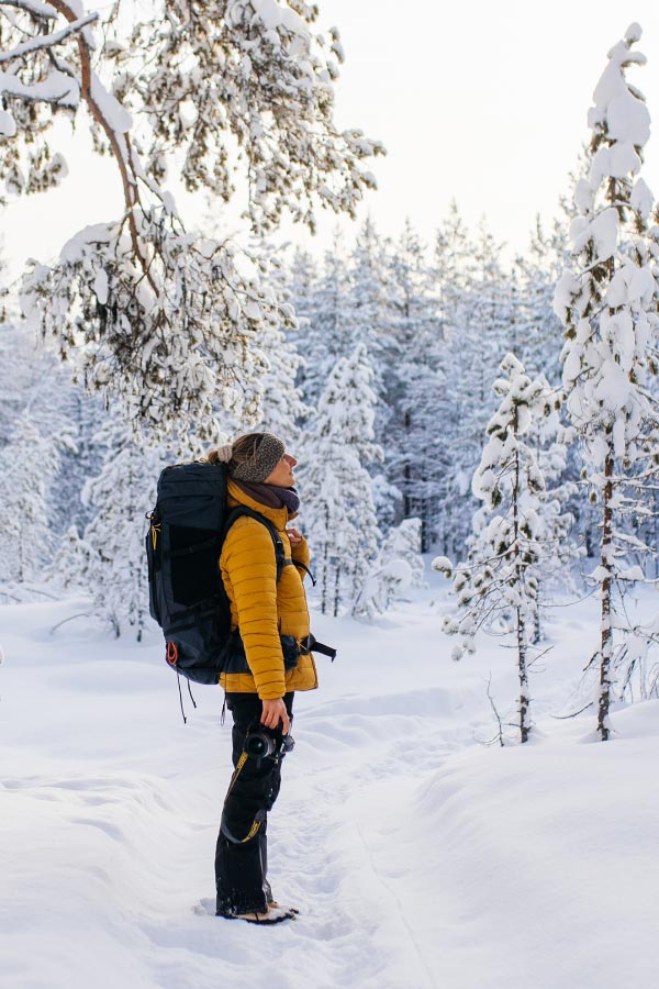 Anna equipped in snow landscape